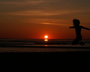 sunrise-women's-beach-red-jump-silhouette-1372058-pxhere.com